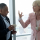 Lucy Mirando (Tilda Swinton) strategizes with Mirando Corp.’s Frank Dawson (Giancarlo Esposito)
